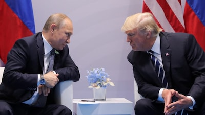 Russian President Vladimir Putin with US President Donald Trump. (Reuters)