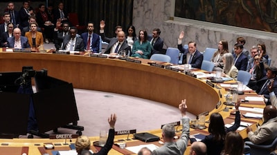 Members of the UN Security Council vote on resolutions regarding the situation in Iran. (Reuters)