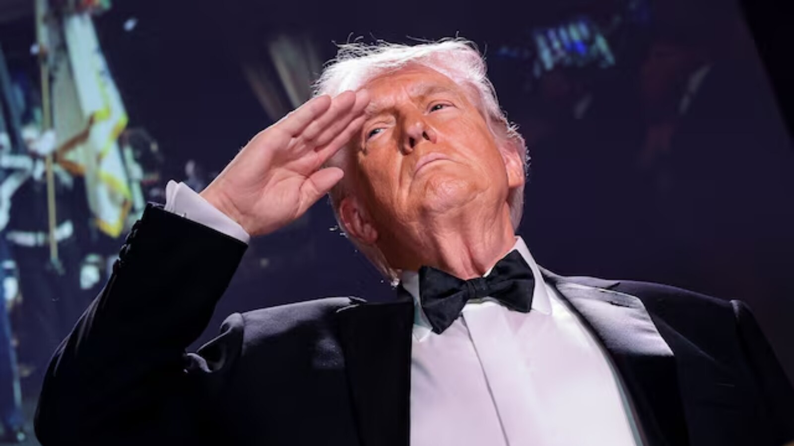 US President Donald Trump salutes during the annual White House Correspondents' Association dinner in Washington. (Image: Reuters)