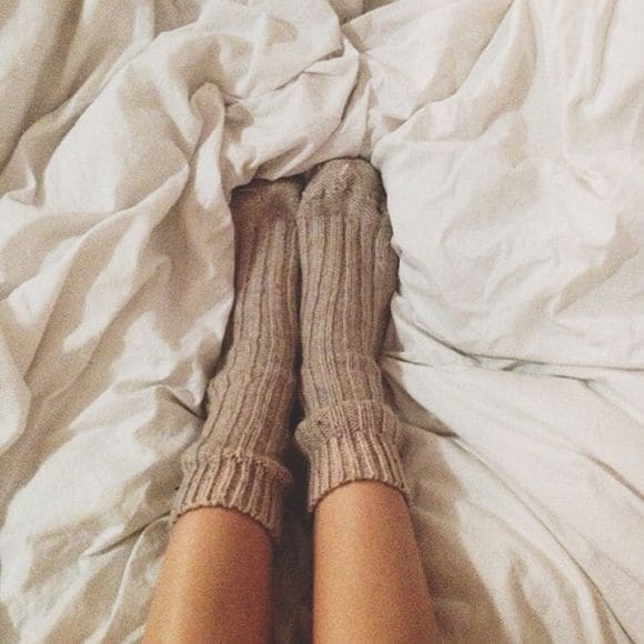 The primary reason socks aid sleep is a process called distal vasodilation.