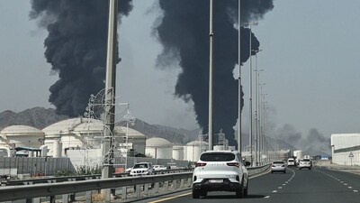 Smoke rises from the direction of an energy installation in the Gulf emirate of Fujairah. (AFP)