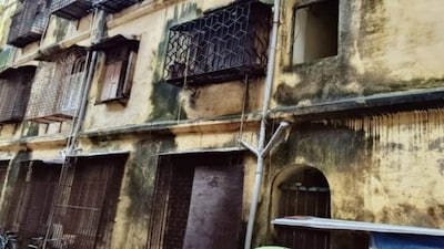 Crumbling walls, weakened foundations, and repeated notices from MHADA have forced several tenants to vacate, while others continue to live under constant fear of collapse.