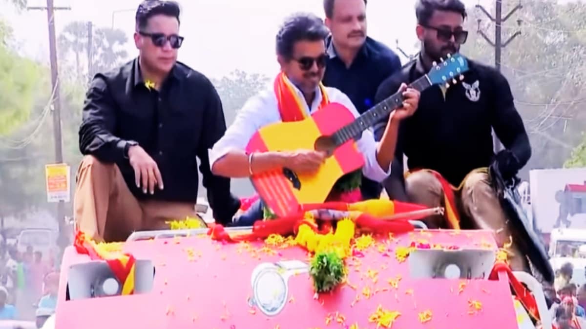 Vijay Takes Center Stage in Tirunelveli: Guitar, Young Supporter and Warm Crowd Interaction