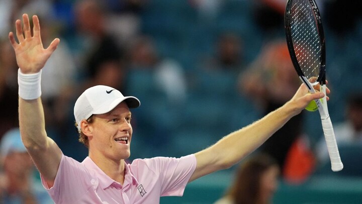 Jannik Sinner Blushes as Coach Darren Cahill Playfully Highlights Motorbike Licence Setbacks While He Pursues Further Historic Triumphs