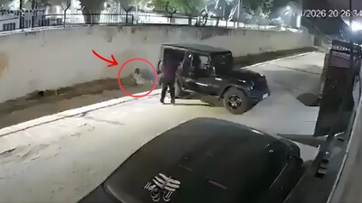 CCTV clip shows the moment a Thar rolled backwards during parking, leading to a fatal accident in UP (Image-X/@lakshaymehta08)