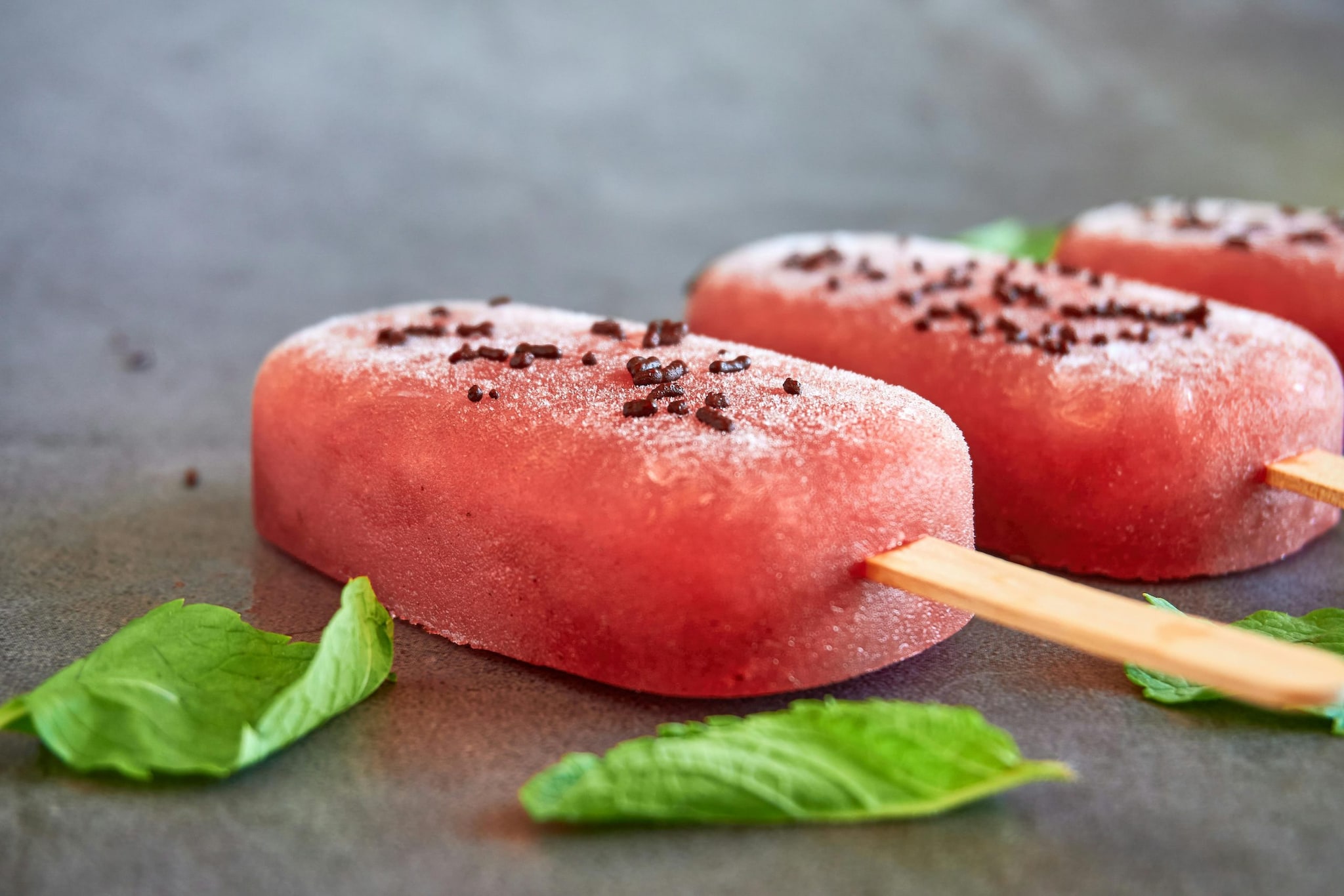 Blend until the watermelon chunks remain. Pour the mixture into a loaf rin and freeze for two hours until the mixture is frozen. (Image: Pexels)