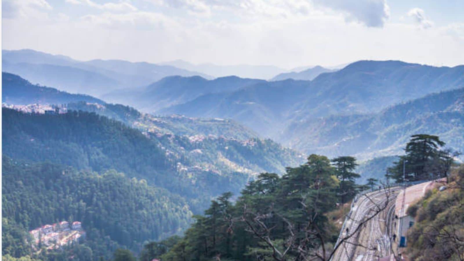 When summer heat starts to rise, a cool escape to the hills is often the first thing on everyone’s mind. And what better way to get there than through a scenic train journey? Across India, several railway routes wind through mountains, valleys and forests, turning the journey itself into an experience.
