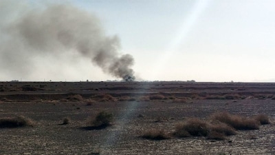This handout photo provided by Iran's Revolutionary Guard Corps (IRGC) official website Sepah News on April 5, 2026 shows smoke billowing reportedly from the site of targeted and crashed aircraft in central Iran. (Photo: AFP)