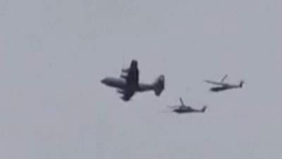 US aircraft, followed by two helicopters, flying over the town of Zaras in the southern Iran's Khuzestan province.