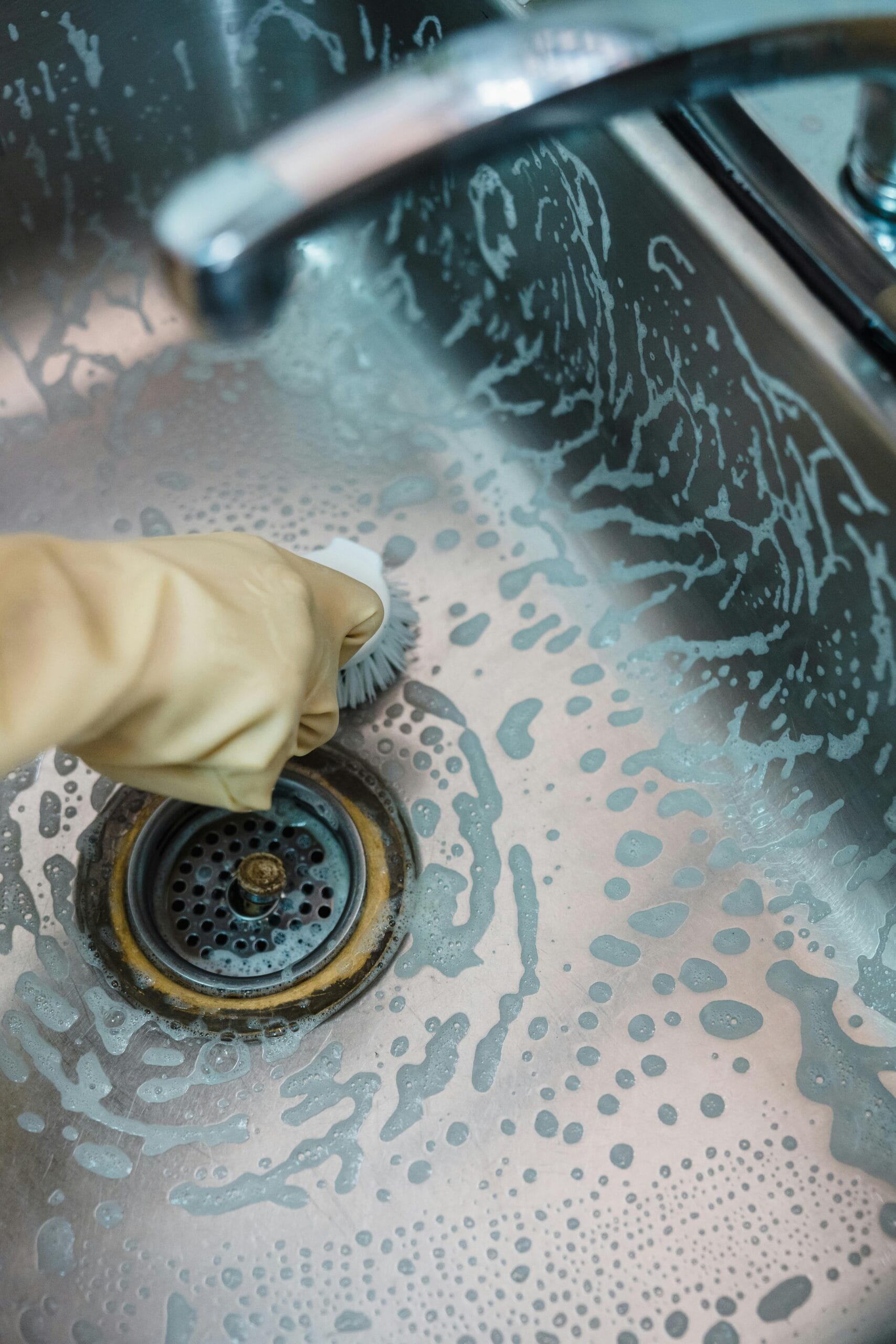 3. Unclogging A Kitchen SinkKitchen sinks in Indian homes often get clogged because of oil, food particles, tea leaves, and soap residue. Using a plunger, drain-cleaning solution, or even a mixture of baking soda and vinegar may help clear minor blockages.