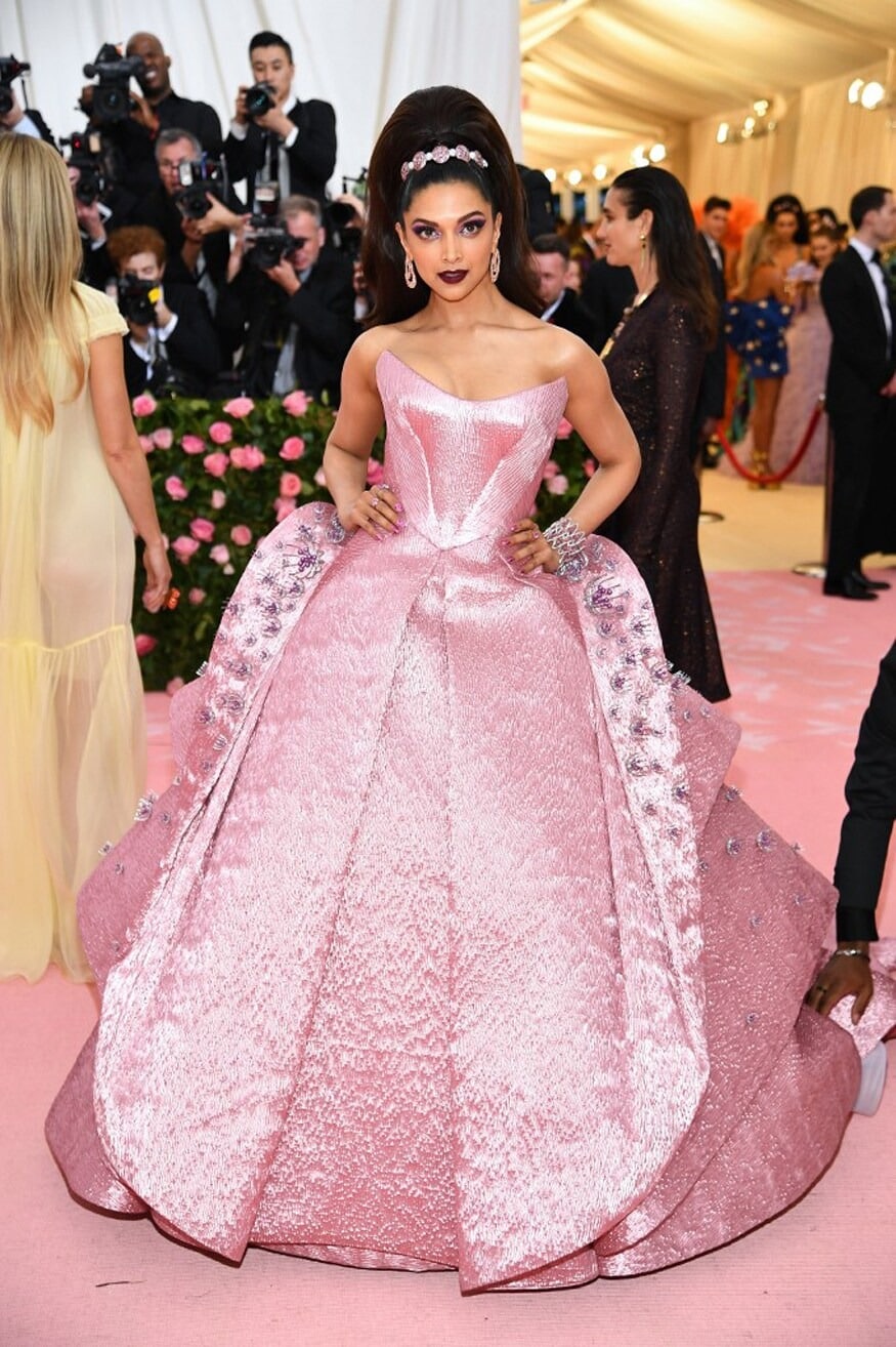 Deepika Padukone: Long before Barbiecore took over, Deepika Padukone channelled the iconic doll aesthetic in a striking pink Zac Posen gown for the Camp: Notes on Fashion theme. She styled the look with a dramatic high ponytail and bold marsala lips, adding to its theatrical appeal. The strapless gown, crafted from lurex jacquard, was elevated with 400 pieces of intricate three-dimensional embroidery, making it a true showstopper. (File Photo)