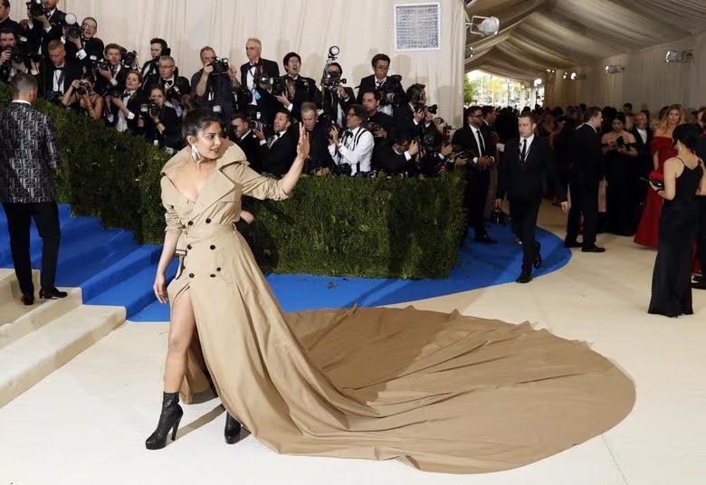 Priyanka Chopra: For her Met Gala debut in 2017, Priyanka Chopra turned heads in a dramatic Ralph Lauren trench coat-inspired ensemble. One of the first Bollywood stars to attend the event alongside her husband Nick Jonas, Chopra embraced the evening’s theme, Rei Kawakubo/Comme des Garçons: Art of the In-Between. While the look paid tribute to the avant-garde spirit of the theme, it quickly took on a life of its own—sparking a wave of memes on social media and cementing its place as a memorable pop-culture moment. (File Photo)