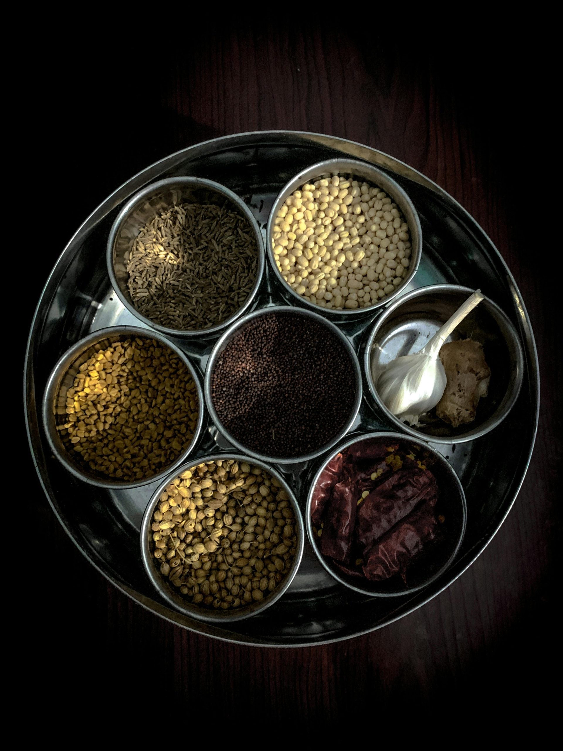 Next, heat some oil and add mustard seeds. When the seeds splutter, add hing and mix well. Next, heat some oil and add mustard seeds. When the seeds splutter, add hing and mix well.