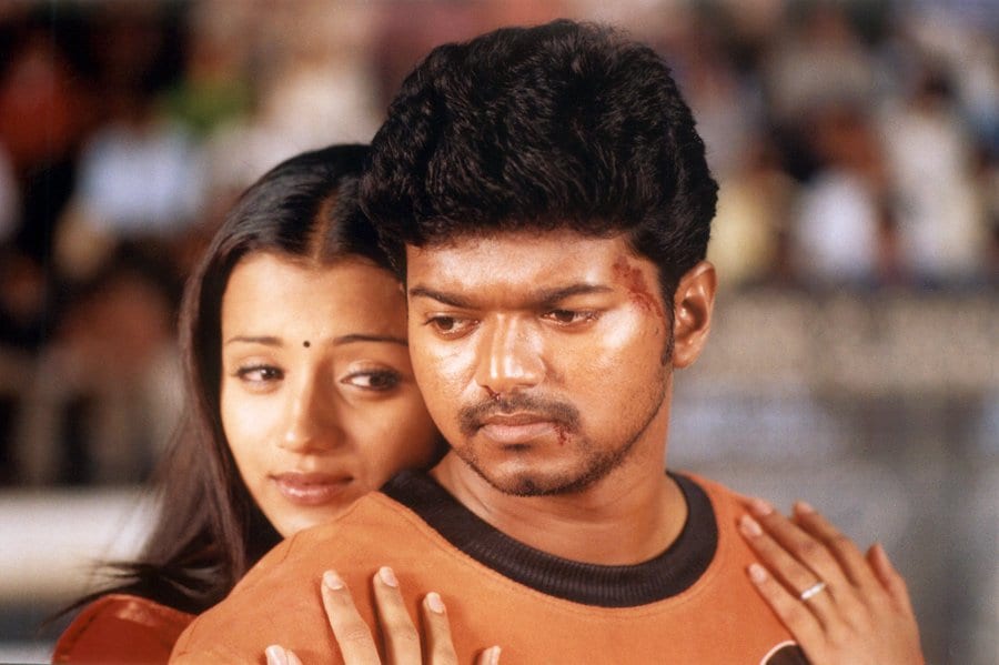Ghilli, co-starring Trisha, changed everything in 2004. Vijay’s transformation into a mass action hero, one who protects women, confronts powerful men, and delivers justice when institutions fail, cemented the saviour image that followed him into politics.