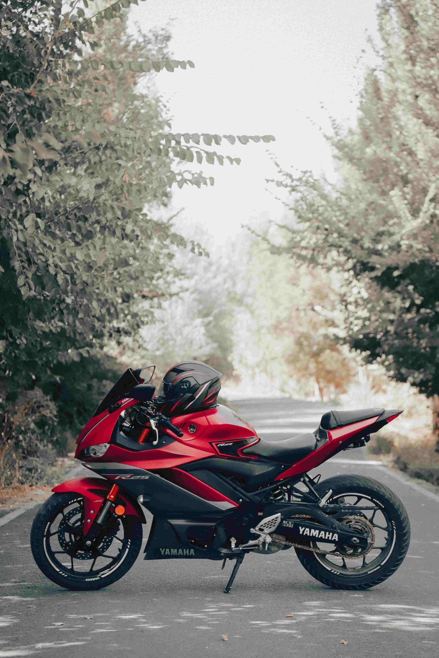 An elevated rear seat also plays a critical role in preventing accidents. On standard flat-seat motorcycles, there is a constant danger of a passenger's legs, loose clothing, pants, or saree fringes getting caught in the rear wheel, leading to severe falls. The raised design creates a safer clearance distance, drastically reducing this risk. (Image: Pexels)
