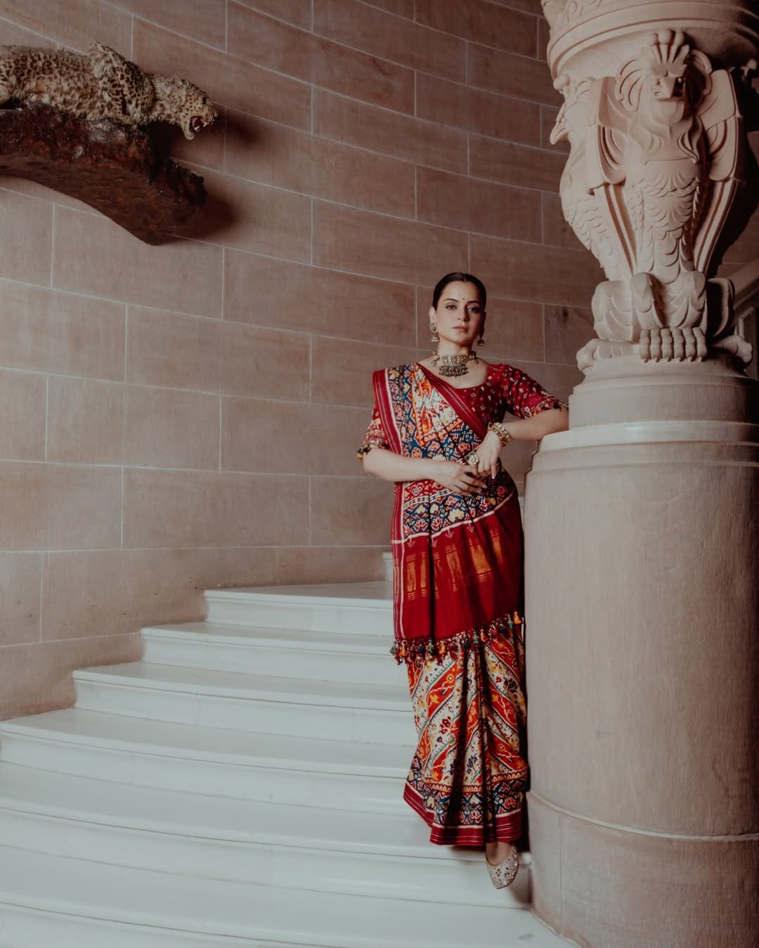 Patan Patola Silk: The actress opted for a handwoven Patan Patola saree, one of the most cherished textile traditions of Gujarat. She paired it with a raw silk blouse, hand-embroidered with traditional Patan motifs in beads and pearls. (Image: Instagram/@kanganaranaut) Patan Patola Silk: The actress opted for a handwoven Patan Patola saree, one of the most cherished textile traditions of Gujarat. She paired it with a raw silk blouse, hand-embroidered with traditional Patan motifs in beads and pearls. (Image: Instagram/@kanganaranaut)
