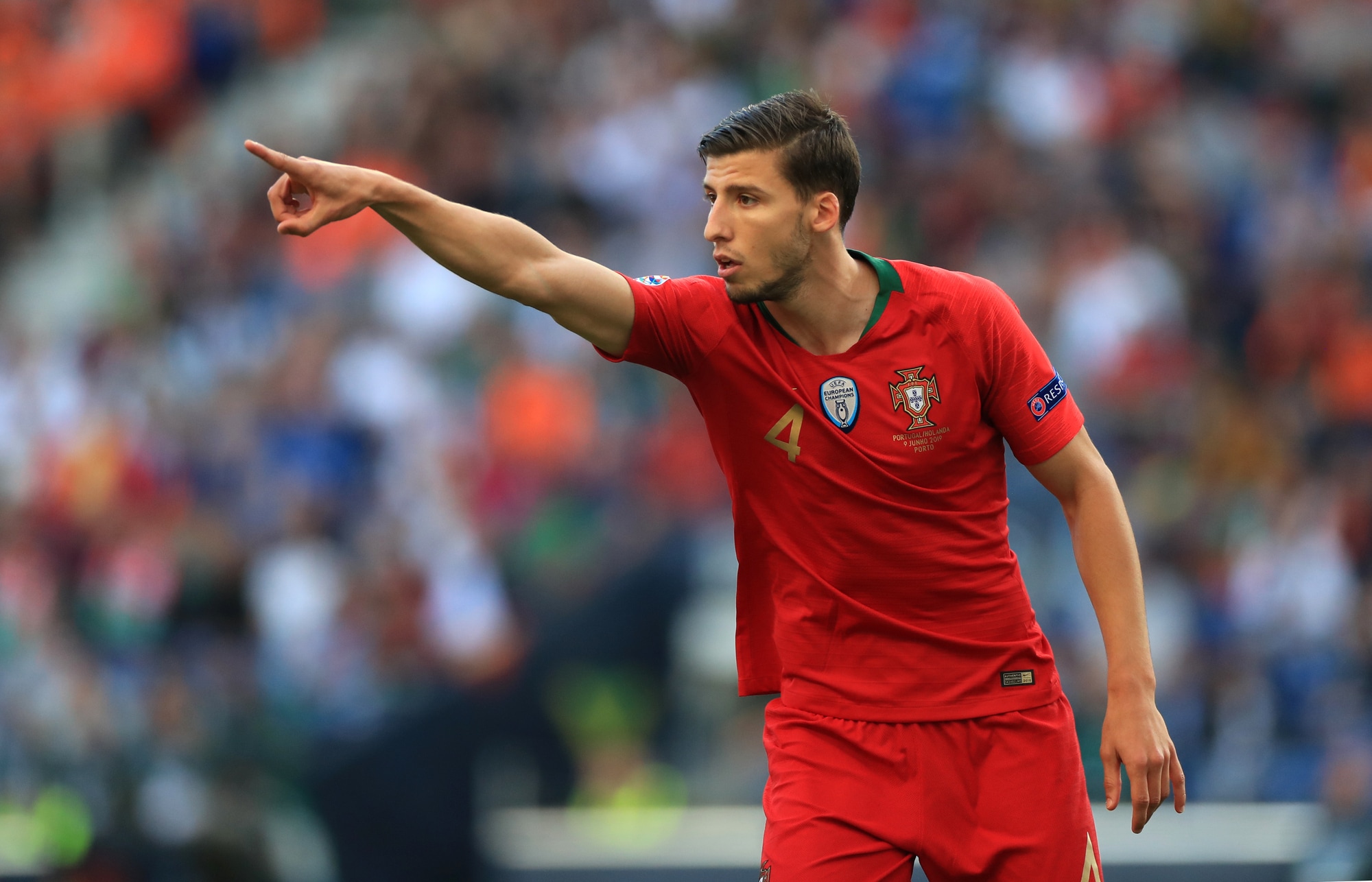Rúben Dias anchors the defense with leadership and stability at the back.