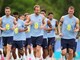 England's Harry Kane, center, jogs with teammates including Jordan Henderson, second left, and Dan Burn, second right, during a training for the national soccer team in Palm Beach Gardens, Fla., Tuesday, June 9, 2026, ahead of the World Cup soccer tournament. (AP Photo/Rebecca Blackwell)