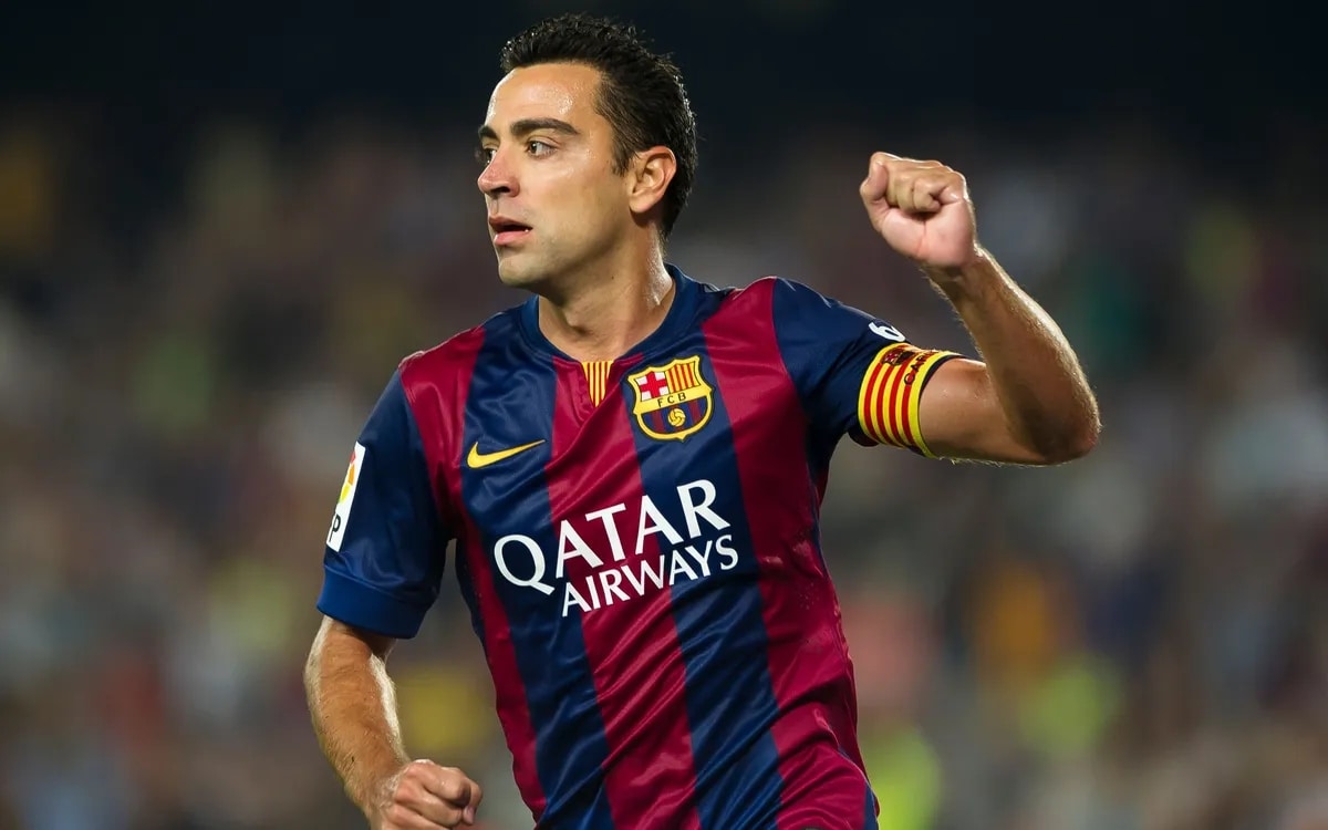 Midfield — Xavi Hernández: If football had a conductor, it was Xavi. His passing range and tactical mastery helped define an era and provided the perfect foundation for many of Messi's greatest performances. (Image: fcbarcelona.com)