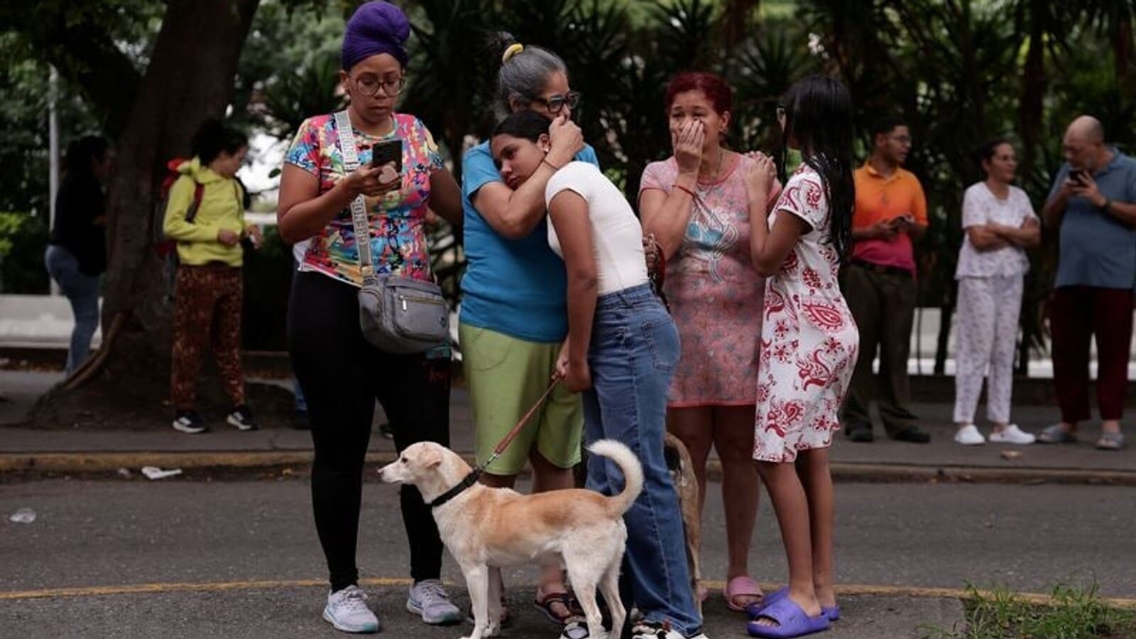People react as they gather after an earthquake, in Caracas, Venezuela, June 24, 2026. REUTERS/Gaby Oraa