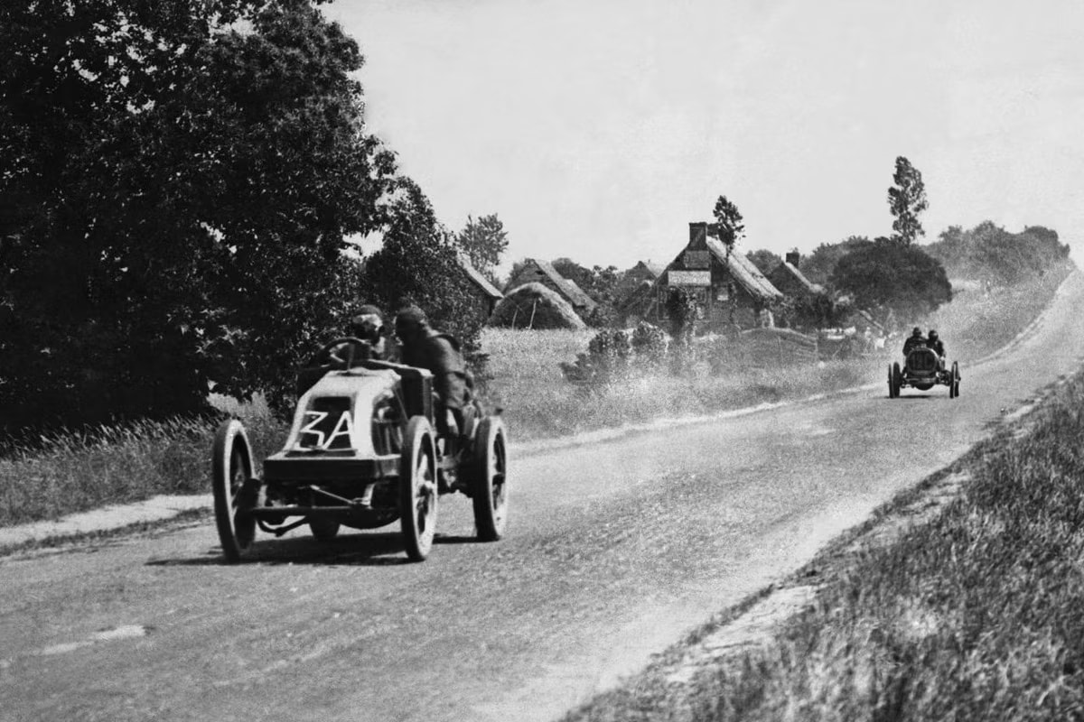 The first French Grand Prix in 1906 at Le Mans featured early automobiles racing on public roads with minimal safety measures. (File photo)