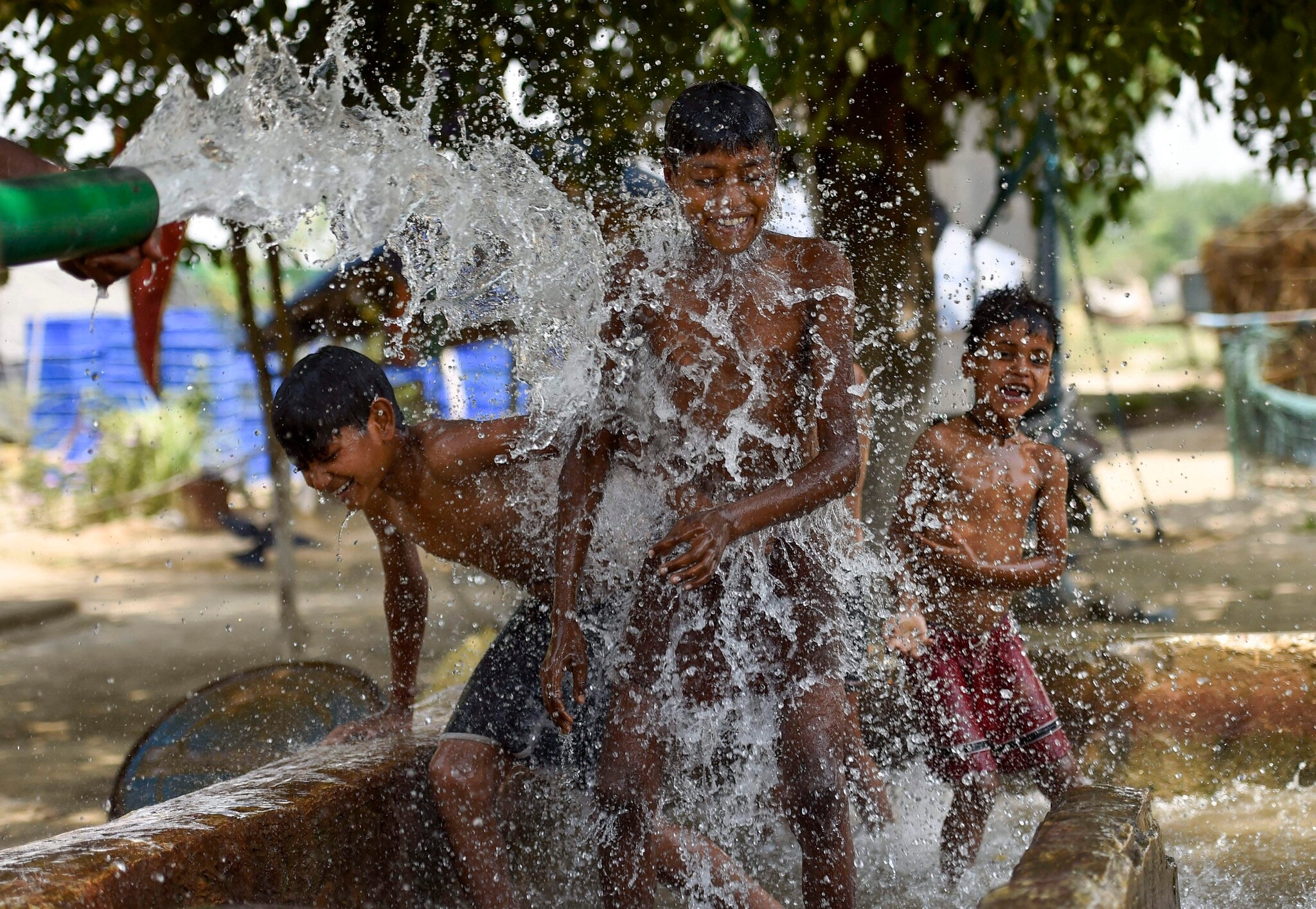 Indian city skyline under intense summer sun, representing rising urban heat risk identified in University of Oxford study