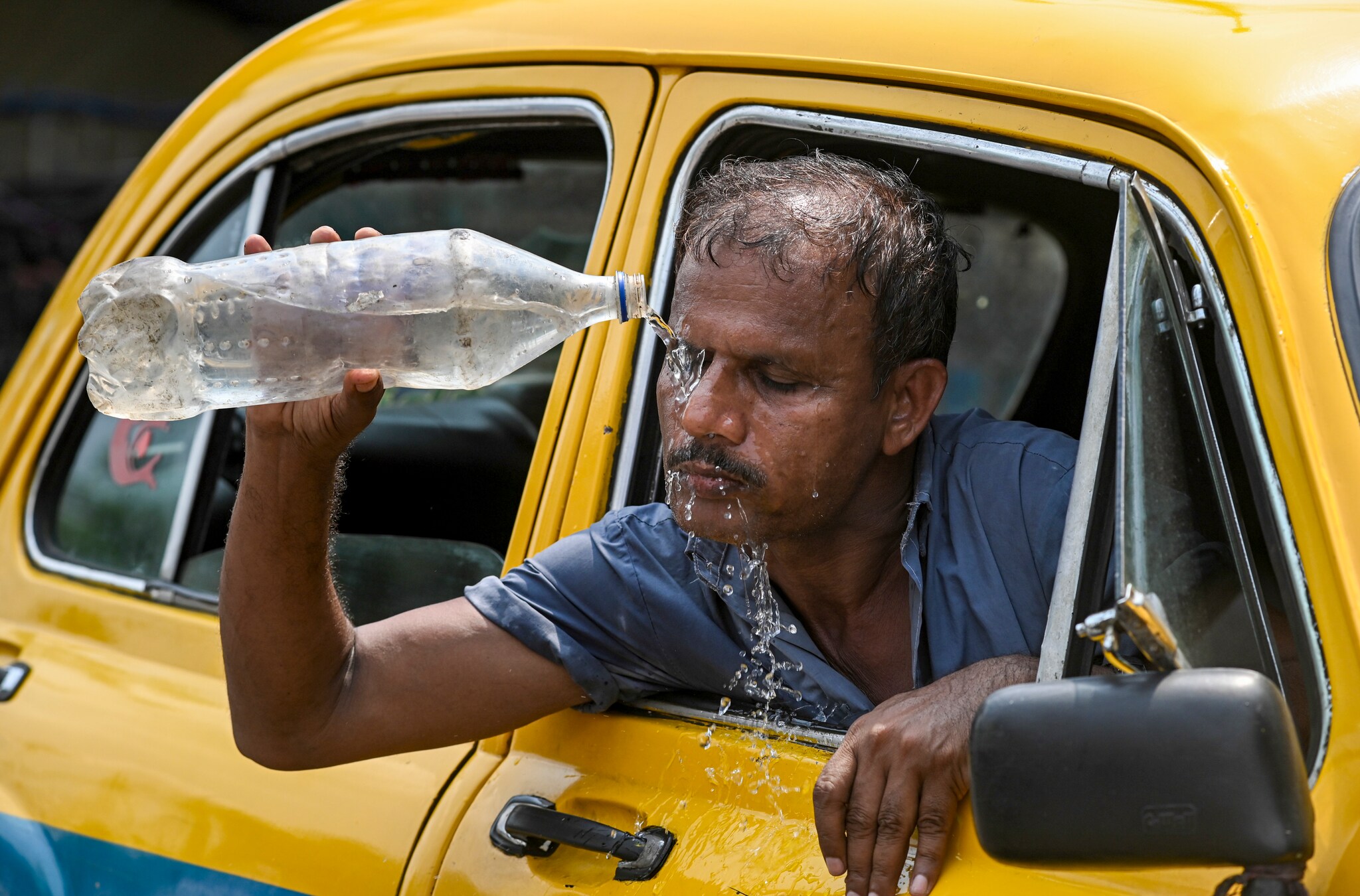 Indian city skyline under intense summer sun, representing rising urban heat risk identified in University of Oxford study
