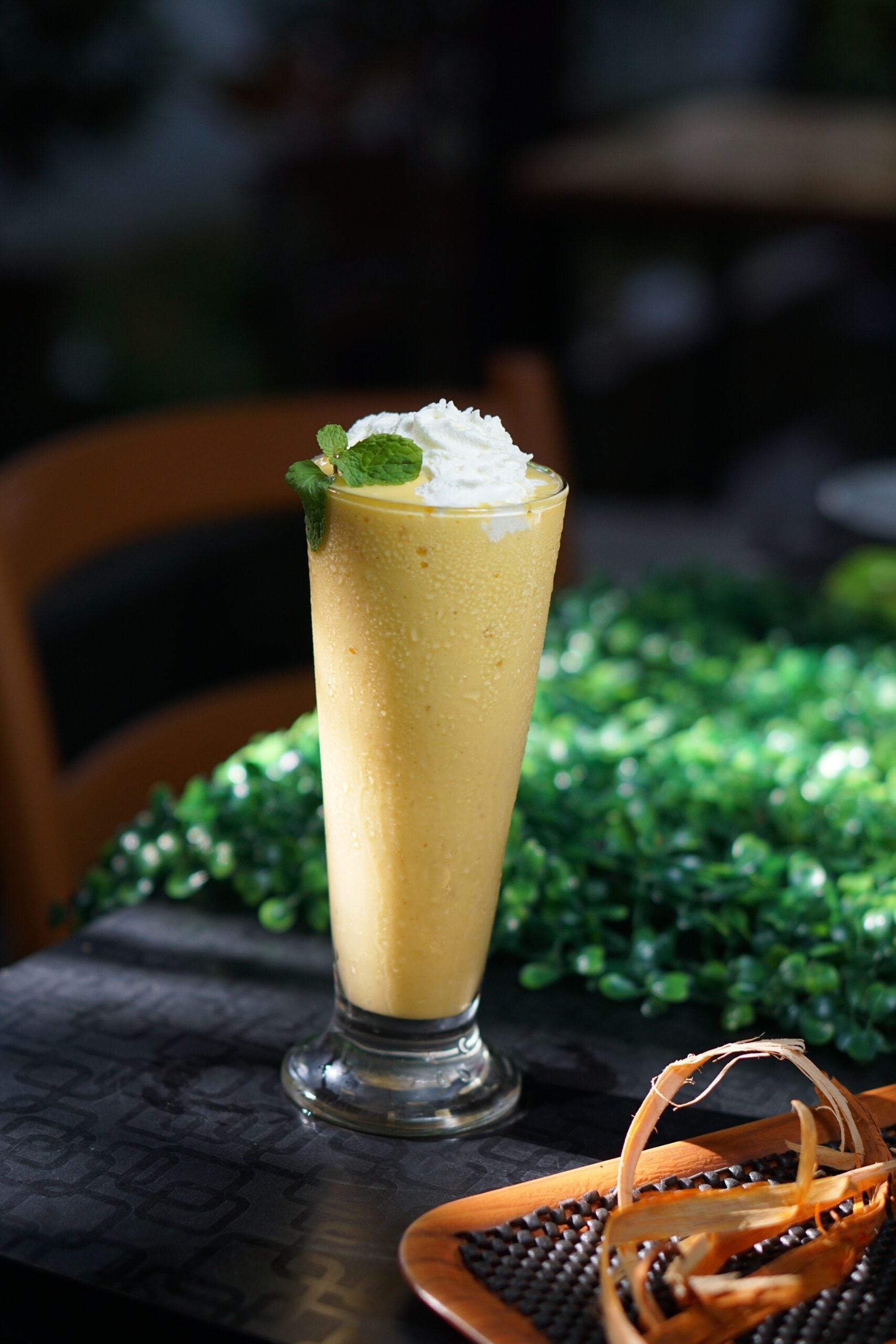 Add ice cubes and blend it again so that the milkshake gets a frothy texture.