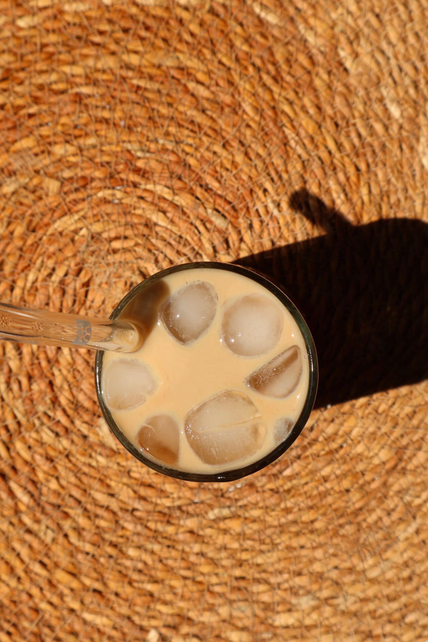 Fill your glass with ice: Take a tall glass and add plenty of ice cubes. This helps maintain the chill and gives the drink a café-style feel.