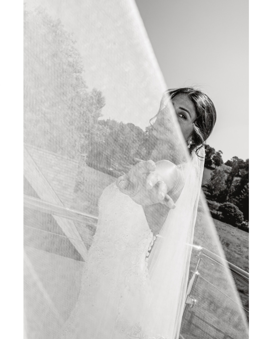Jennifer's bridal ensemble has become one of the biggest talking points. She wore a custom-made white strapless wedding gown featuring a structured corset bodice with a sweetheart neckline and delicate floral embroidery.