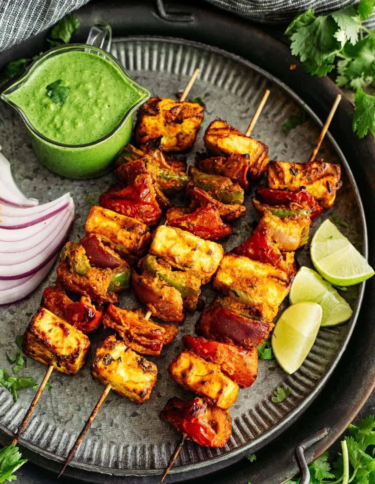 Paneer Tikka: Paneer tikka is a simple crowd-pleaser that works well for festive gatherings. Marinate paneer cubes with curd, spices, ginger and garlic, add vegetables such as capsicum and onion, and cook them in an oven, air fryer or pan. Serve with mint chutney. Paneer Tikka: Paneer tikka is a simple crowd-pleaser that works well for festive gatherings. Marinate paneer cubes with curd, spices, ginger and garlic, add vegetables such as capsicum and onion, and cook them in an oven, air fryer or pan. Serve with mint chutney.
