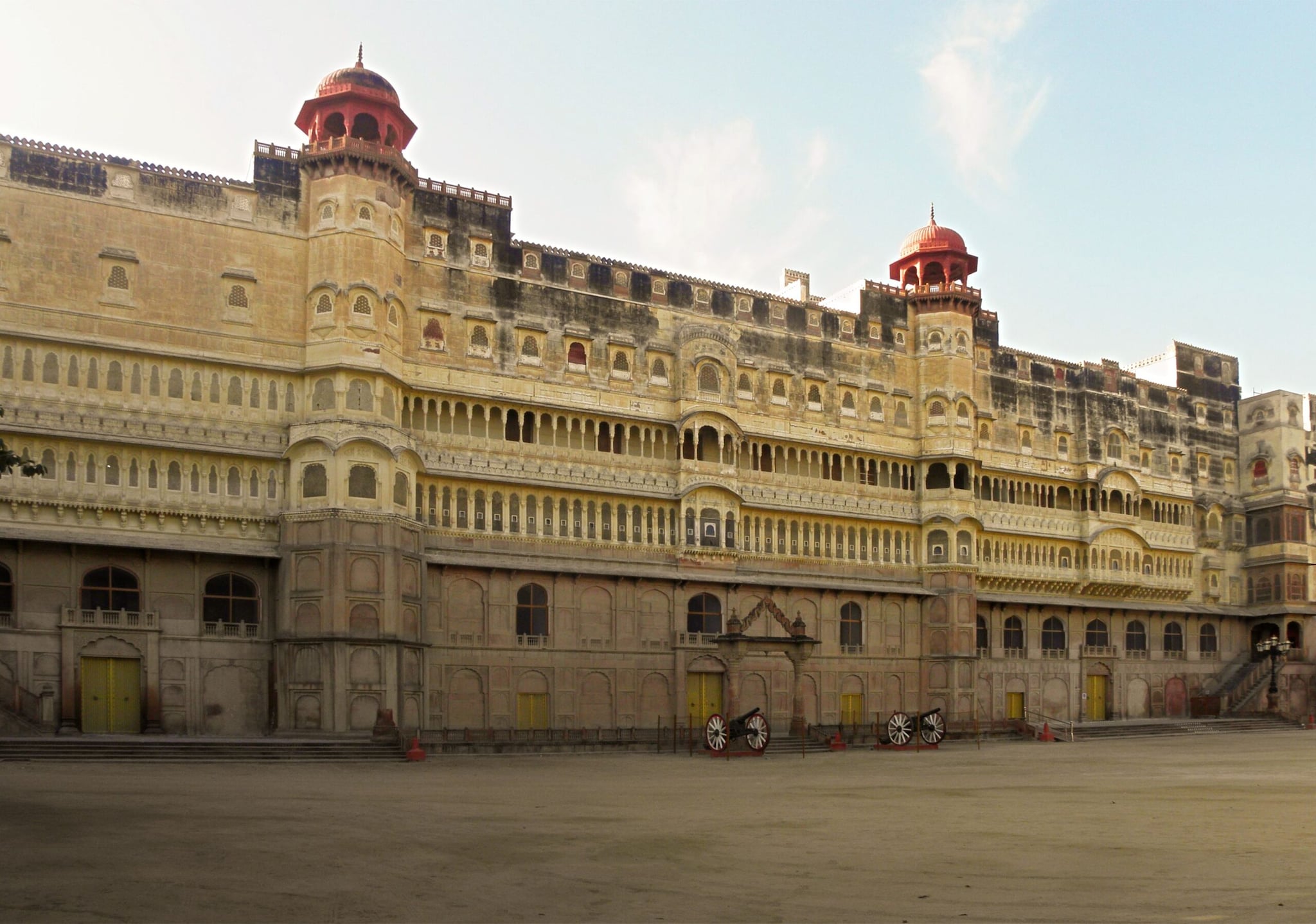 Bikaner, RajasthanBikaner experiences a hot desert climate with annual rainfall averaging around 250-300 mm. The city is famous for its historic forts, camel breeding farm, and vibrant desert festivals.