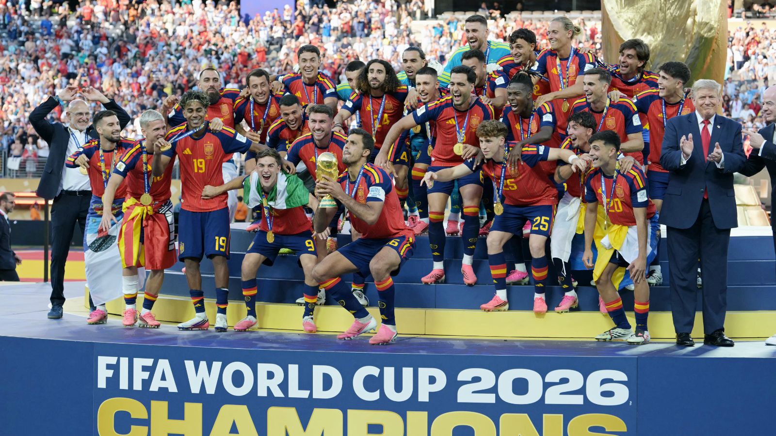 Donald Trump refuses to leave stage as Spain celebrate FIFA world cup victory Donald Trump refuses to leave stage as Spain celebrate FIFA world cup victory