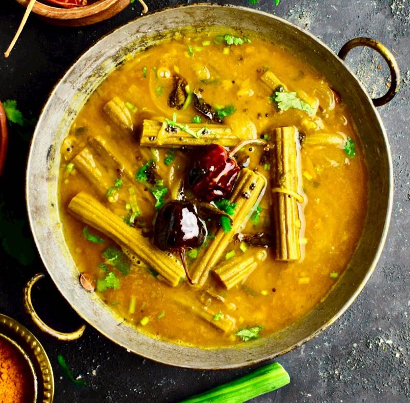 Drumstick And Tomato Rasam: Infuse tangy tomato broth with drumstick extract, black pepper, cumin, and coriander. Drinking this light, peppery soup piping hot stimulates digestion, clears sinus congestion, and delivers a robust burst of antioxidants to strengthen seasonal immunity. Drumstick And Tomato Rasam: Infuse tangy tomato broth with drumstick extract, black pepper, cumin, and coriander. Drinking this light, peppery soup piping hot stimulates digestion, clears sinus congestion, and delivers a robust burst of antioxidants to strengthen seasonal immunity.