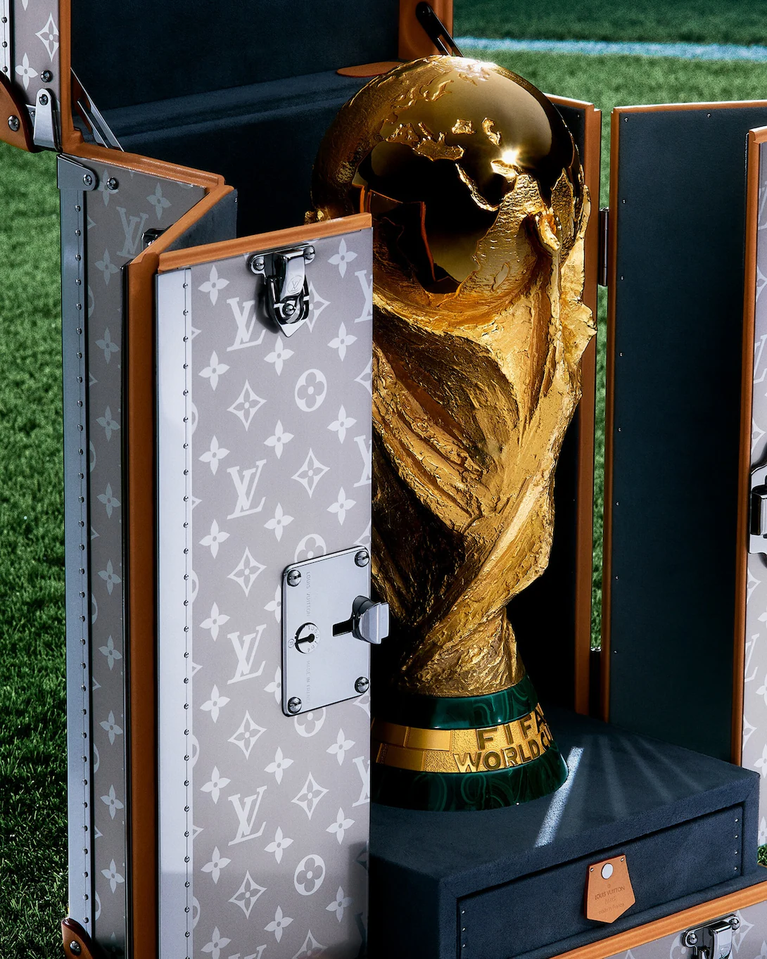 This is far from Louis Vuitton's only brush with sport. Owned by LVMH, the house holds a 10-year contract to craft bespoke trophy trunks for major Formula 1 Grands Prix, served as the Australian Open's Official Trophy Trunk Partner in 2026, and has returned to the America's Cup as Title Partner of its 37th edition — proof that its sporting playbook runs far deeper than football alone. (Credit: Louis Vuitton)