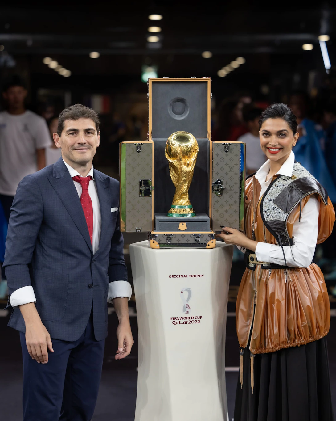 "For over a decade, Louis Vuitton and FIFA have shared an unwavering commitment to excellence, bound by a shared belief in sport's power to inspire and bring people together," said Louis Vuitton Chairman and CEO Pietro Beccari. The trunk itself is built to protect a trophy that weighs 6.175 kilograms and is crafted from 18-carat gold and malachite — carried onto the pitch on final day by a football icon and a Louis Vuitton ambassador. In 2022, Deepika Padukone made history doing the honours at Lusail Iconic Stadium in Qatar. (Credit: Louis Vuitton)