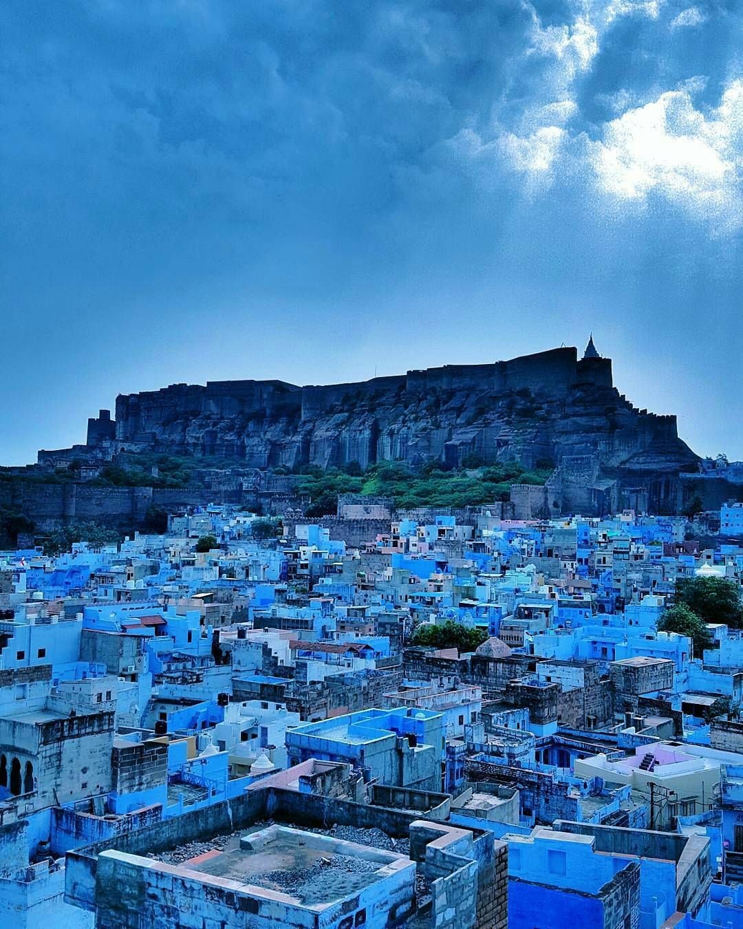 Jodhpur, RajasthanPopularly called the Blue City, Jodhpur receives around 350-400 mm of rainfall annually. Despite its dry climate, it remains one of India's most visited heritage cities, thanks to Mehrangarh Fort and its vibrant old town.