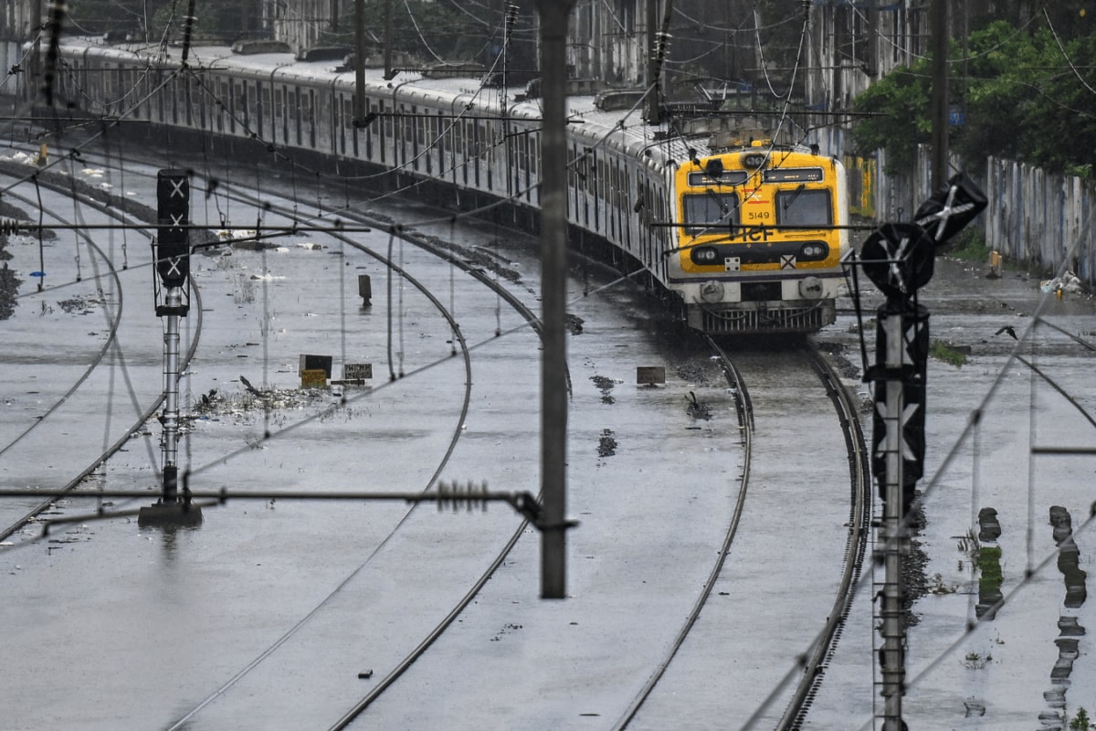 Mumbai Rains In Pictures: Flooded Tracks, Cancelled Trains, Stranded Commuters