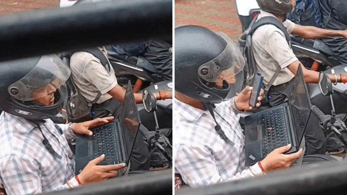 Man Works on Laptop During Traffic Jam