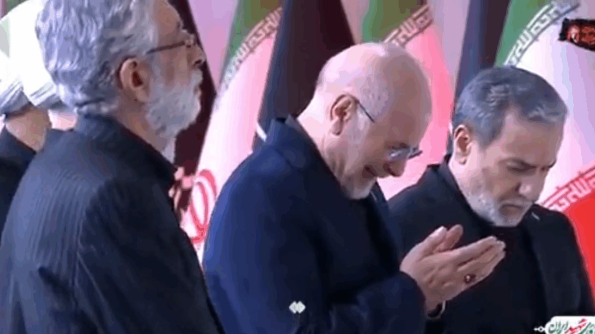 With Hands Clasped In Prayer, Ghalibaf, Araghchi Break Down At Khamenei’s Funeral | Video