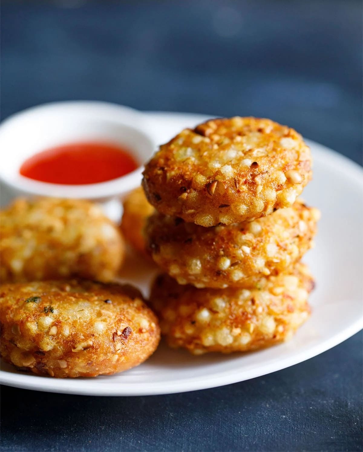 Crispy sabudana vadas made with tapioca pearls, peanuts and potatoes are another popular fasting snack. They are especially enjoyed during monsoon evenings with chutney or yoghurt. (File photo)