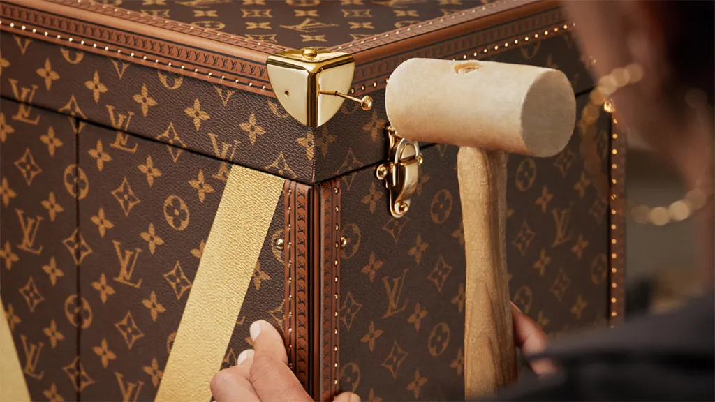 Louis Vuitton is the official supplier and branded licensee of the FIFA World Cup 2026, continuing a legacy that stretches back to 2010. The house previously created trophy trunks for the 2010, 2014, 2018 and 2022 tournaments, making this year's edition the fifth in an unbroken run. (Credit: Louis Vuitton)