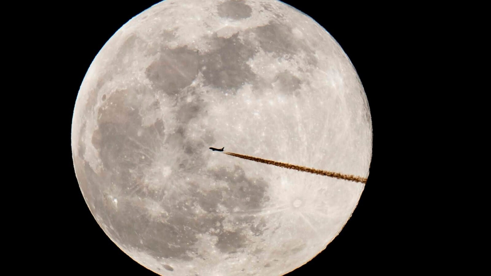 A plane flies past a full moon, Tuesday, Feb. 19, 2019, in Nuremberg, Germany. Tuesday’s full moon, or supermoon, appears... A plane flies past a full moon, Tuesday, Feb. 19, 2019, in Nuremberg, Germany. Tuesday’s full moon, or supermoon, appears...