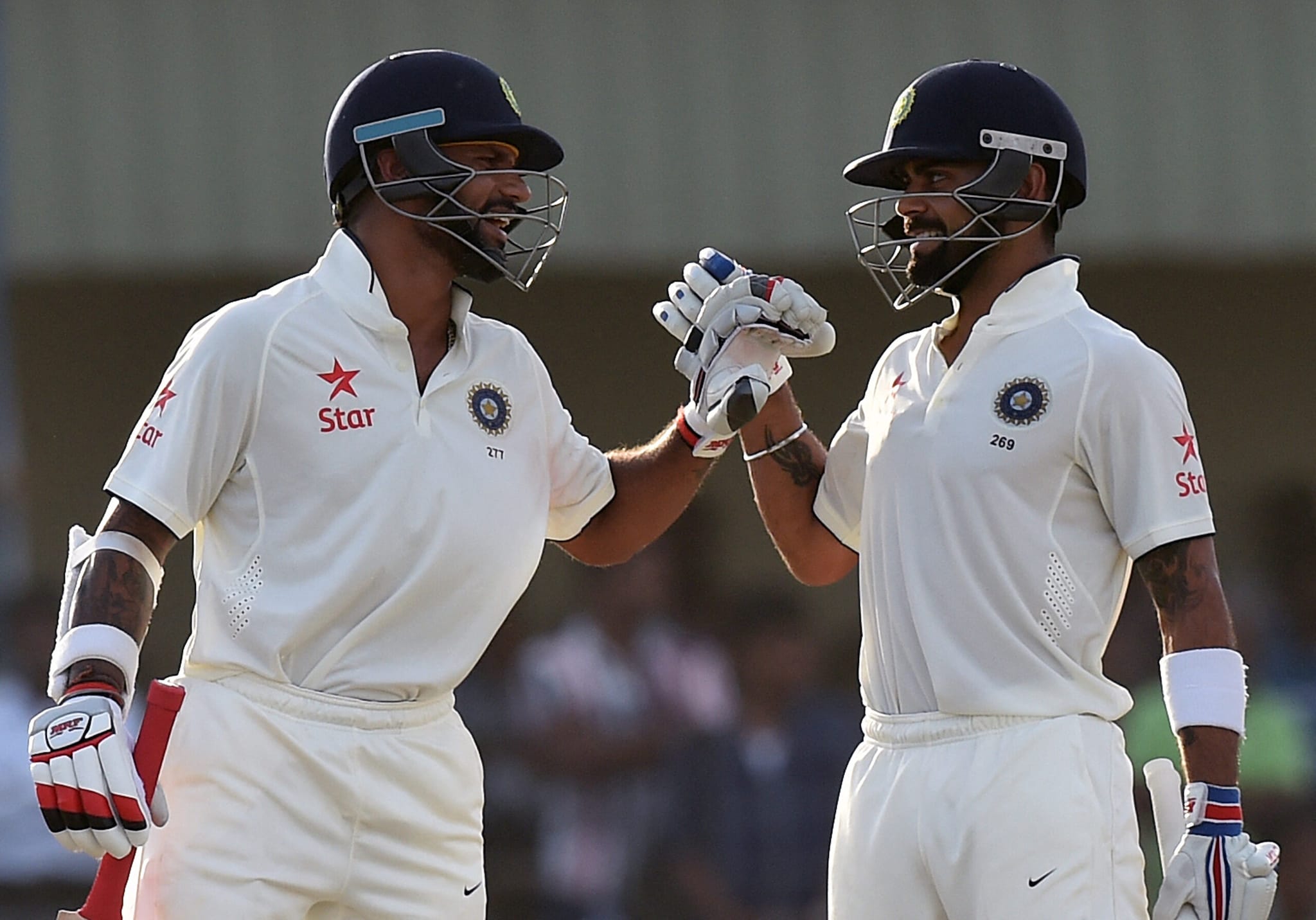 August 12-15, 2015 — Galle International Stadium, Test: Despite establishing a 192-run lead with first-innings centuries from Virat Kohli (103) and Shikhar Dhawan (134), India suffered a dramatic batting collapse on Independence Day. Chasing 176, the visitors were bowled out for 112, with Sri Lanka's Rangana Herath taking a devastating 7 for 48 to seal a 63-run win. (Photo by Ishara S.KODIKARA / AFP) August 12-15, 2015 — Galle International Stadium, Test: Despite establishing a 192-run lead with first-innings centuries from Virat Kohli (103) and Shikhar Dhawan (134), India suffered a dramatic batting collapse on Independence Day. Chasing 176, the visitors were bowled out for 112, with Sri Lanka's Rangana Herath taking a devastating 7 for 48 to seal a 63-run win. (Photo by Ishara S.KODIKARA / AFP)