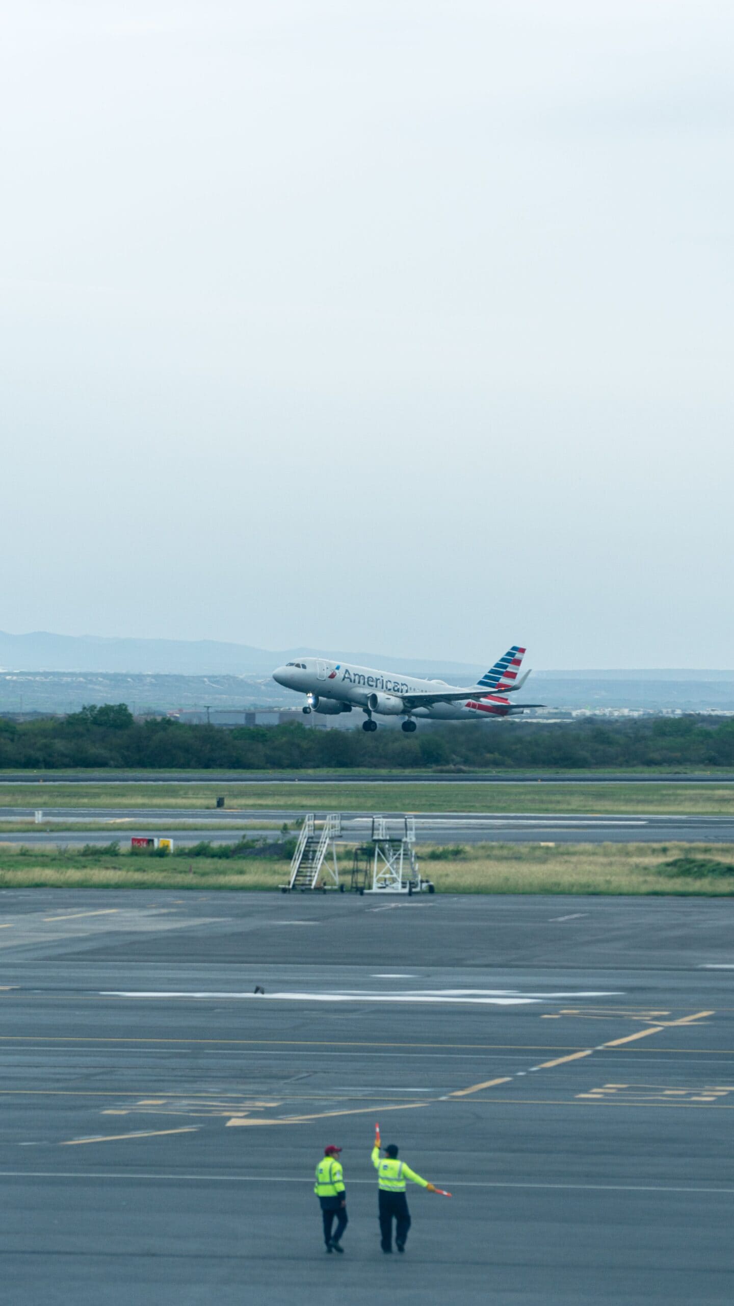 Airline Operations Specialists: Ground crews, flight dispatchers, and aviation engineers manage dynamic airport operations, aircraft maintenance, and rapid weather shifts. Ensuring airworthiness and passenger safety requires hands-on mechanical inspection and physical oversight that digital algorithms cannot deliver. (Image: Pexels)