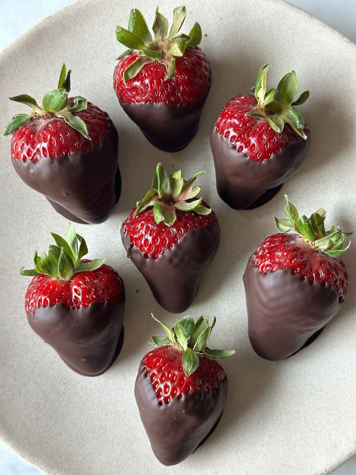 Chocolate Covered Strawberries: Melt rich dark or milk chocolate over a double boiler. Dip fresh, dry strawberries until fully coated, then place them on parchment paper. Chill in the fridge for 10 minutes until set. A classic, elegant, and refreshing festive treat. Chocolate Covered Strawberries: Melt rich dark or milk chocolate over a double boiler. Dip fresh, dry strawberries until fully coated, then place them on parchment paper. Chill in the fridge for 10 minutes until set. A classic, elegant, and refreshing festive treat.