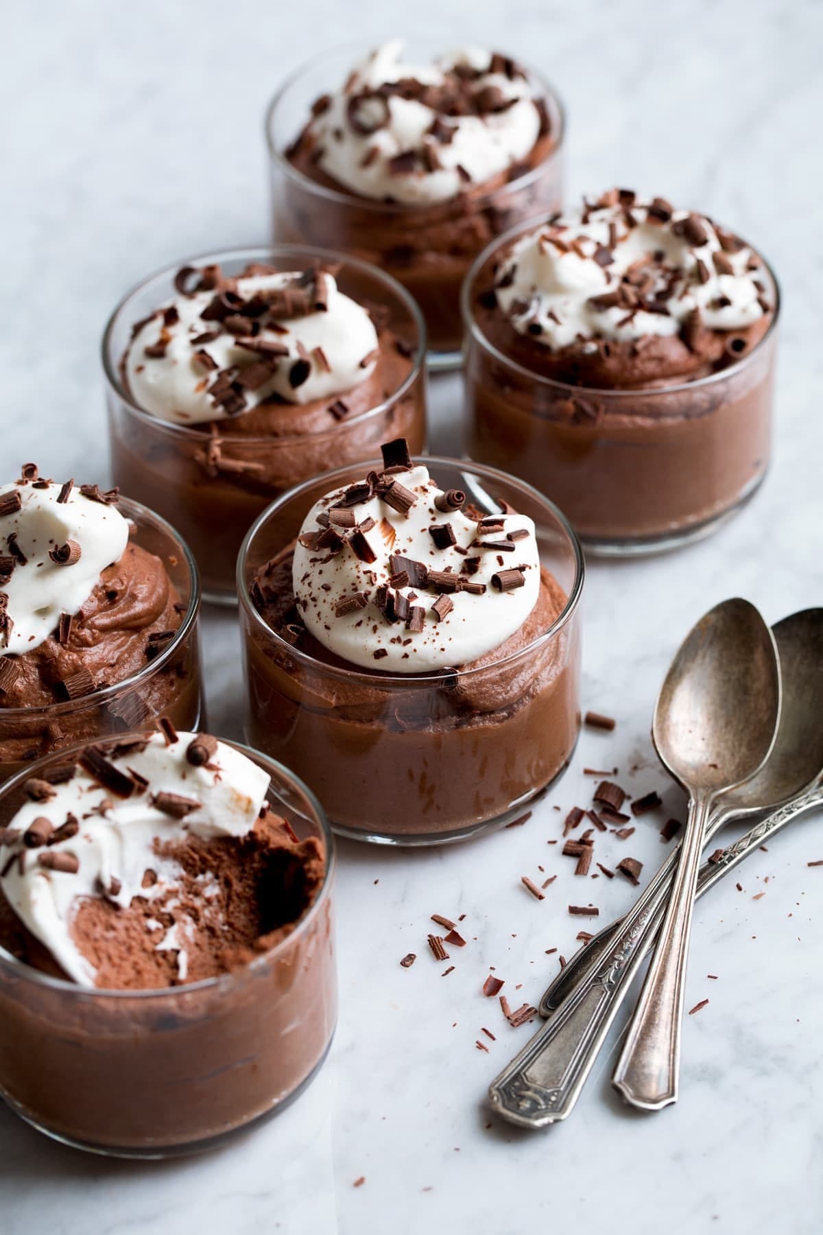 Chocolate Mousse Cups: Whip heavy cream with powdered sugar, cocoa powder, and vanilla extract until stiff peaks form. Pipe into individual mini serving glasses and garnish with grated chocolate. This light, airy, and creamy dessert requires zero cooking time to assemble. Chocolate Mousse Cups: Whip heavy cream with powdered sugar, cocoa powder, and vanilla extract until stiff peaks form. Pipe into individual mini serving glasses and garnish with grated chocolate. This light, airy, and creamy dessert requires zero cooking time to assemble.