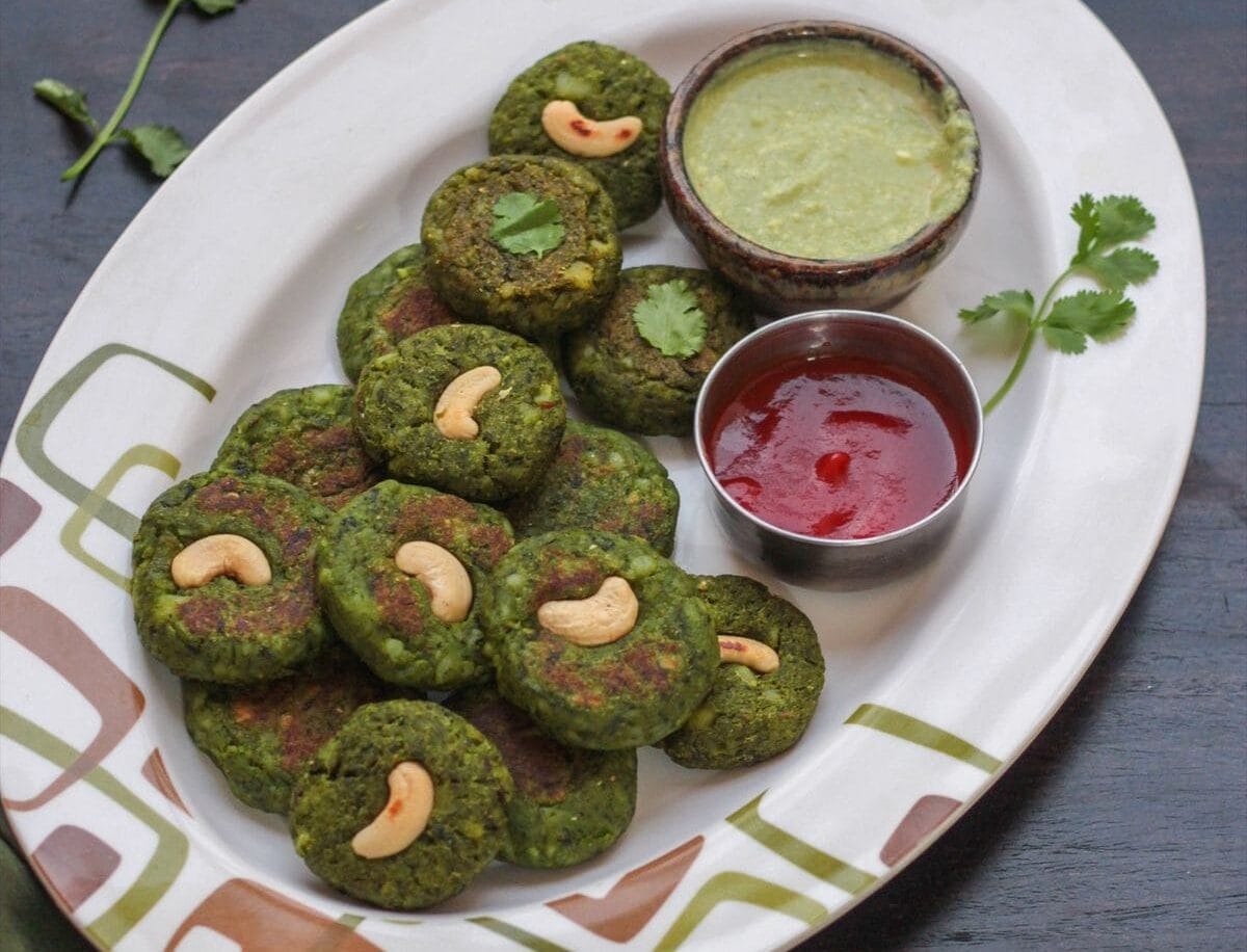 Hara Bhara Kebabs: Made with spinach, peas, potatoes and herbs, hara bhara kebabs are packed with flavour and colour. Instead of deep-frying them, cook them on a tawa or in an air fryer using very little oil. Hara Bhara Kebabs: Made with spinach, peas, potatoes and herbs, hara bhara kebabs are packed with flavour and colour. Instead of deep-frying them, cook them on a tawa or in an air fryer using very little oil.