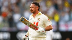 Australia's Travis Head leaves the field after losing his wicket on day two of the first Ashes cricket test match between Australia and England in Perth, Saturday, Nov. 22, 2025.(AP Photo/Gary Day)