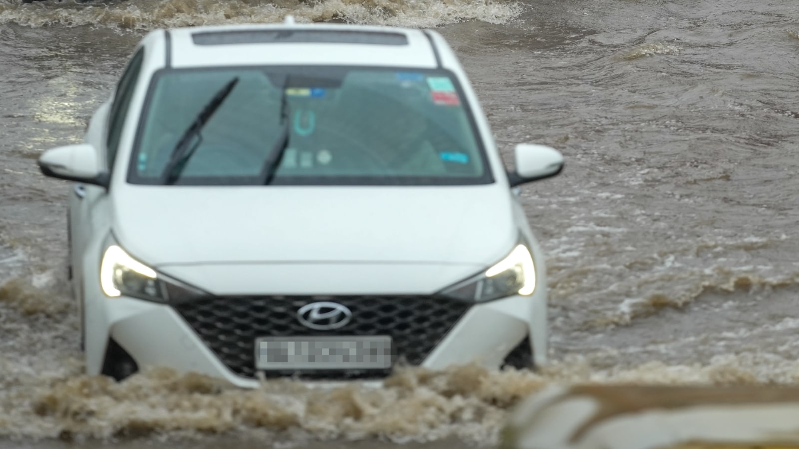 Hundreds of office-goers remained stranded after struggling for hours to book cabs amid the relentless downpour. (Image: PTI) Hundreds of office-goers remained stranded after struggling for hours to book cabs amid the relentless downpour. (Image: PTI)